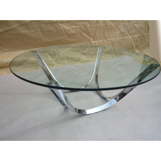 Coffee table attributed to Knut Hesterberg and produced by Ronald Schmitt in the 1970s. It consists of four taut lines of...