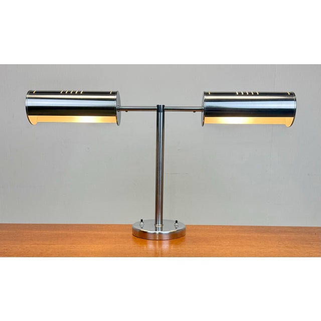 A fantastic Nessen Studio (unsigned) 2-arm table/desk lamp in brushed steel finish featuring independent push switches for...