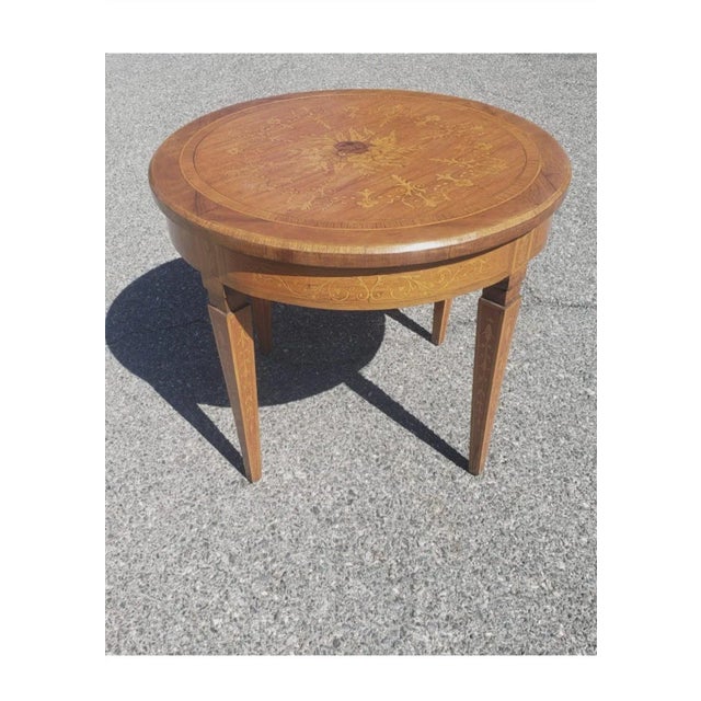 An Early 20th Century Dutch Colonial Style Marquetry mixed Fruitwoods Gueridon Table in good antique condition with...