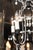 A charming 4-light hand wrought iron Italian chandelier with opaline glass beaded accents and drops. This chandelier has...