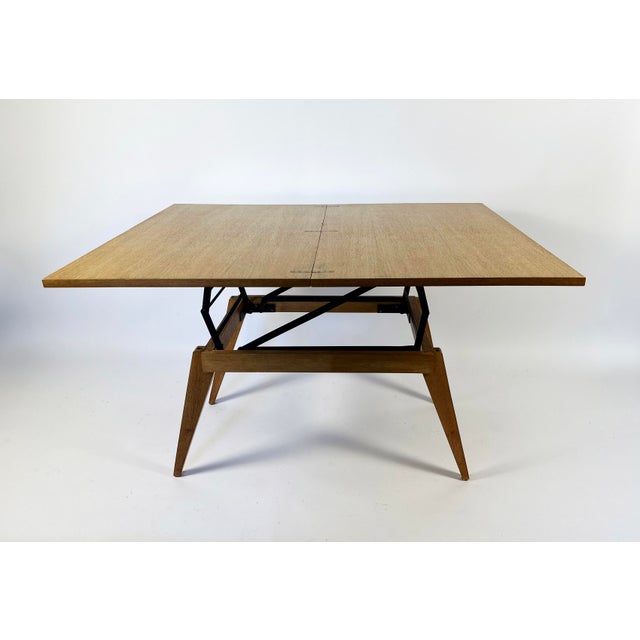 A convertible coffee table that transforms into a four-seat (or six-seat if you like it cozy) dining table in just a few...