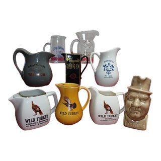 Nine Bourbon Whiskey Pitchers, All Different For Sale