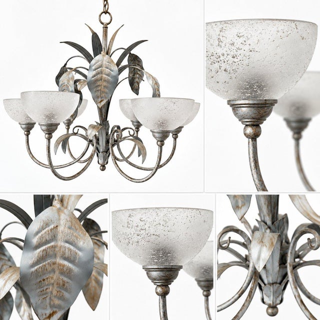 A refined vintage chandelier featuring an elegant floral silhouette with handcrafted metal leaves, curved decorative arms,...