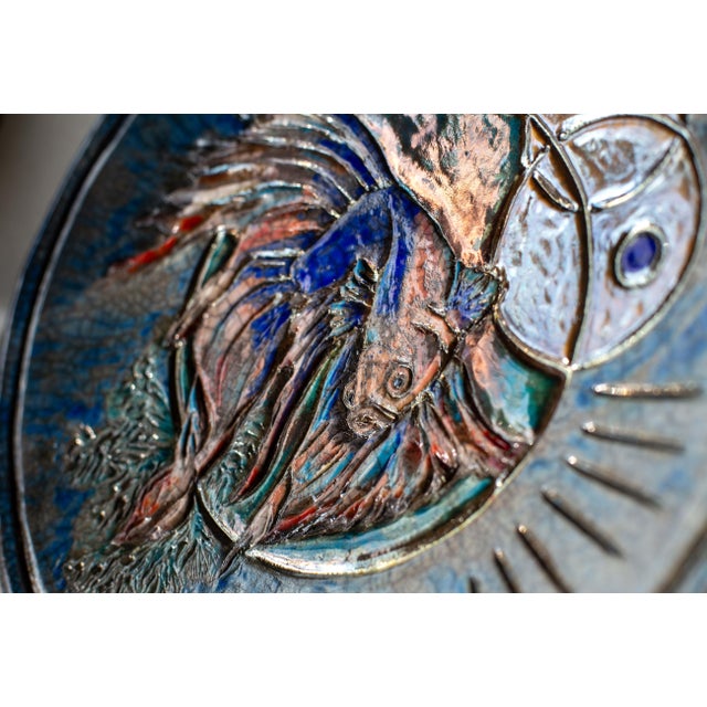Sea Vortex is a sculptural Raku ceramic centerpiece inspired by the movement and vitality of the underwater world. A...