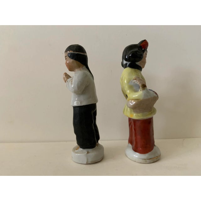 Sweet set of two figures, one male and one female.