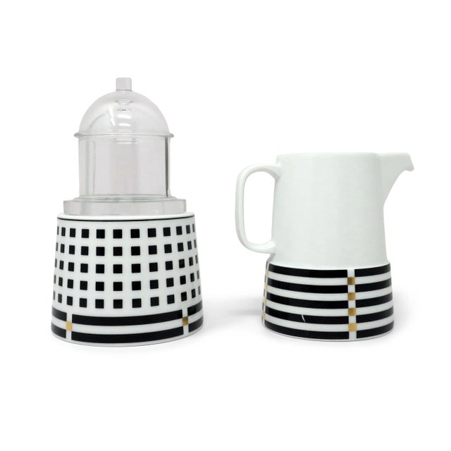 A beautiful set of porcelain creamer and sugar bowl designed by Aldo Rossi for Rosenthal Studio Linie and made in Germany....