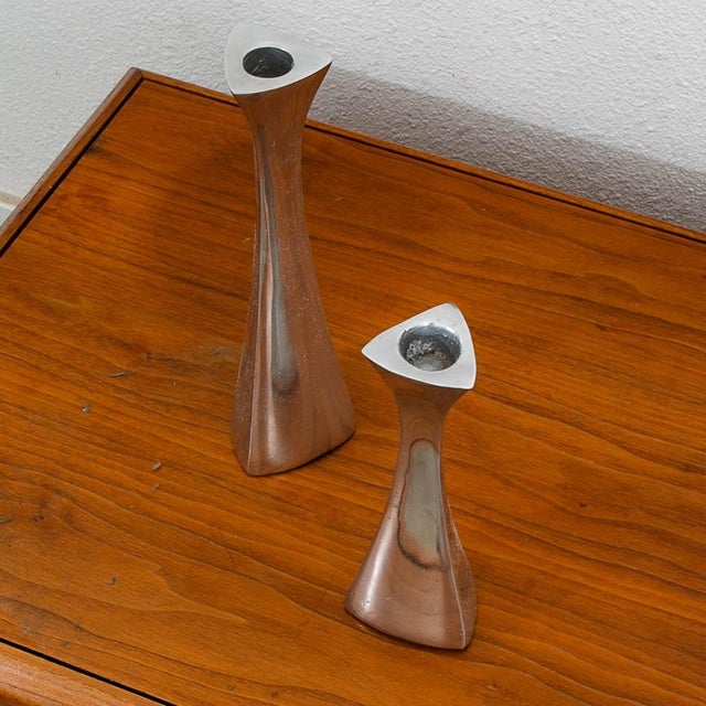Set of two Nambé candle holders for dinner tables at events or at home. Made from tarnish resistant Nambé Alloy. Marked...