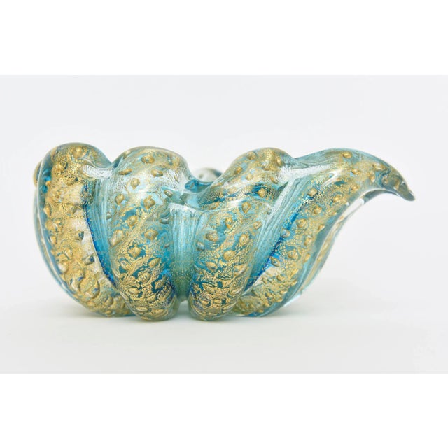 This stunning and magnificent Murano glass bowl by the masters of glass blowing: Barovier e Toso is a must buy. This...