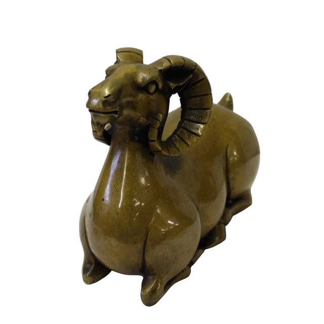 This is a nicely made bronze metal Artistic ram figure with charm light metal color and precise body details. Dimensions:...