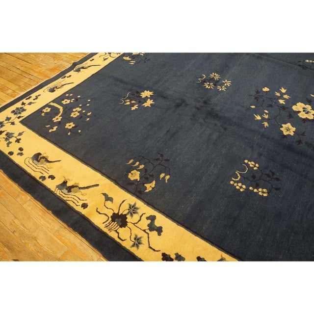 Antique Peking Chinese Floral Blue 1930s Blue Rug, Circa Date: 1930s. This exceptional example of Chinese weaving from the...