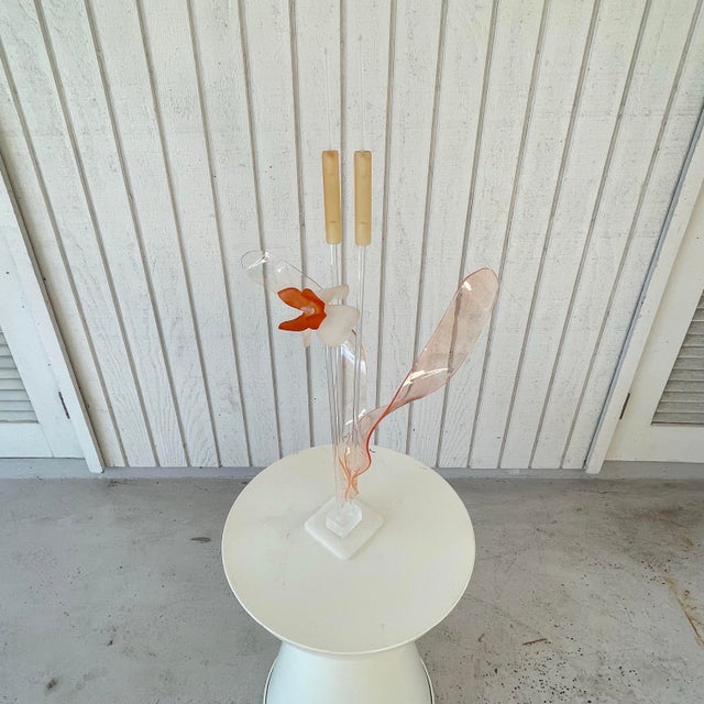 A vintage, 1970’s lucite floral arrangement, composed of handmade pieces of lucite. It is easily disassembled and...