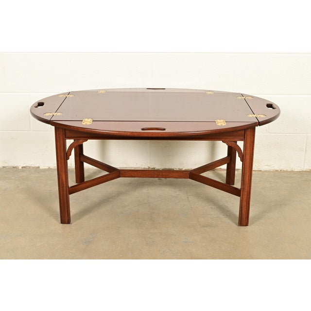 A gorgeous Chippendale or Georgian style butler's coffee table By Henkel Harris USA, 1978 Carved solid mahogany, with...