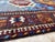 Karachov Kazak design rug, hand-knotted in 100% wool with a dense, plush pile. Cornflower blue field with six bold...