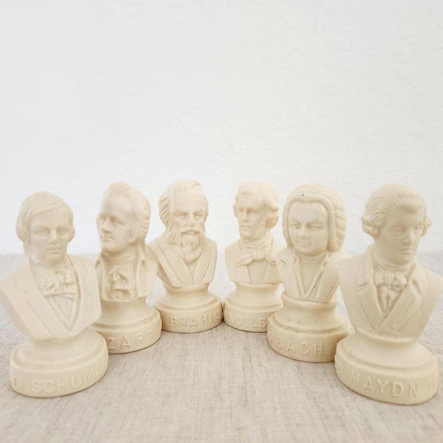 A set of 6 vintage statuettes of composer busts; makers trademark of "Halbe". Set includes one of each: Mozart, Brahms,...