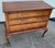 18th-century English Queen Anne crossbanded walnut chest on frame. Three herringbone-inlaid drawers with original 18th-...