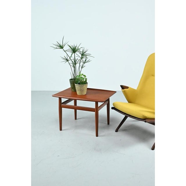 Grete Jalk side table for Glostrup Møbelfabrik from Denmark. The table is made of teak and has round shapes typical for...