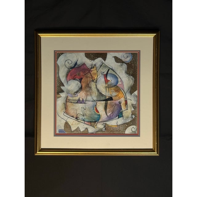 Vibrant framed abstract mixed media painting featuring a layered composition with swirling lines, geometric shapes, and...