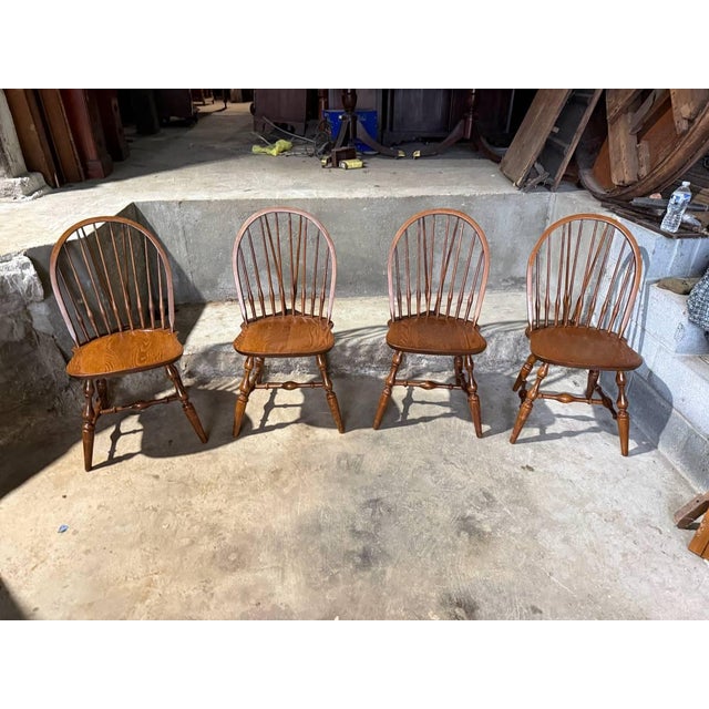Set of 4 Nichols & Stone Brace Back Windsor Style Oak Side Chairs Solid wood frame, spindle back with spray turned legs....