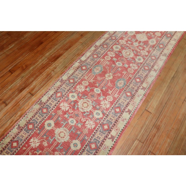 a 2nd quarter of the 20th century narrow east turkestan khotan runner. Details rug no. j3329 size 2' 5" x 7' 11" (74 x 241...