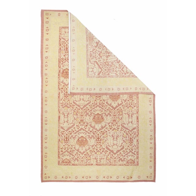 These Sumaks are a recent Turkish innovation. Here we find a slightly shaped lattice of palmettes, leaves and crowns, in...