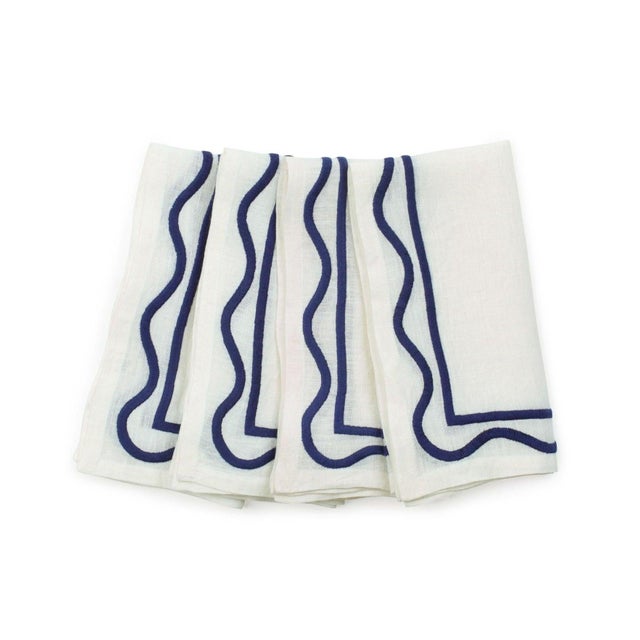 Your table deserves better than a boring paper napkin. The linen Colorblock Embroidered Napkins deliver instant (and eco-...