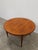 Authentic vintage mid century modern teak extendable dining table with built-in leaf. By G Plan. Maker's label on bottom...