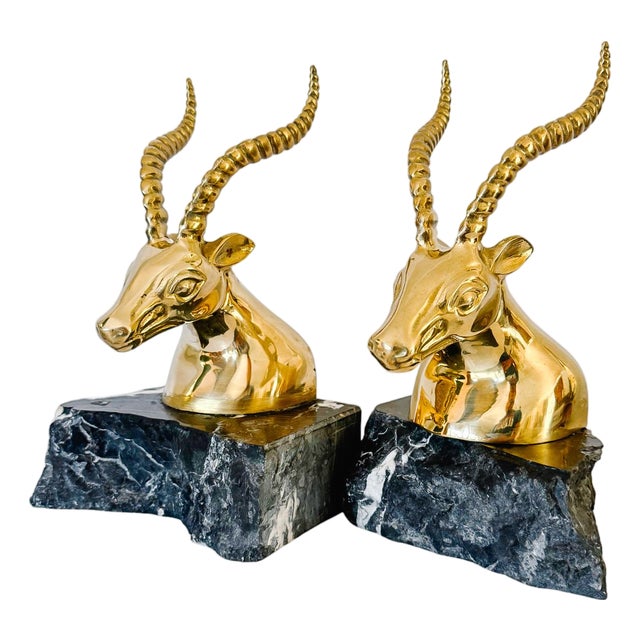 1970s Hollywood Regency Brass Gazelle / Antelope Head Bookends on Raw Edge Marble Bases - A Pair For Sale