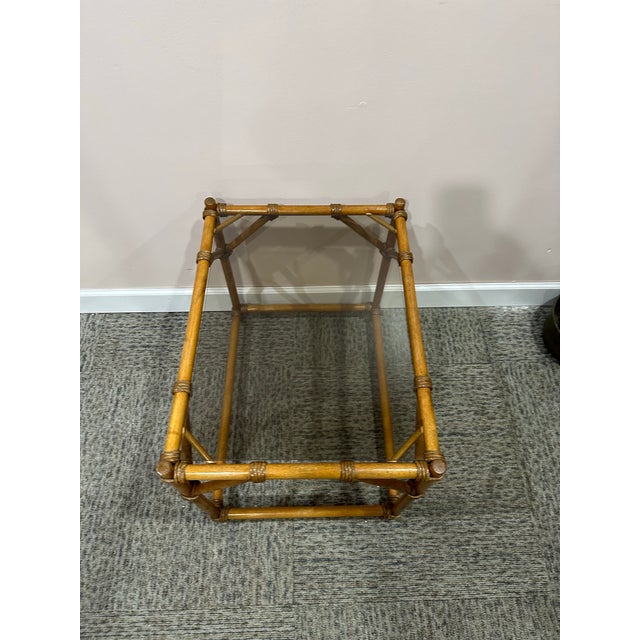 Super clean 1950’s rattan glass top side table . Measures 24.75” x 20.25” x 18” h This is the real deal , priced to sell ....