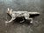 Circa late nineteenth/early twentieth century silver animal figure, likely German. Fox is in a stalking position, mid-...
