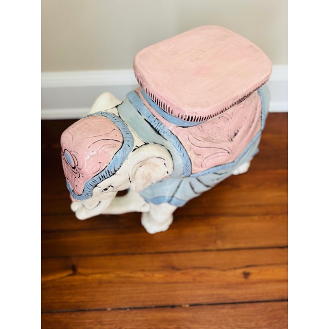 Pastel pink and blue! Super cute pastel pink and blue garden stool or seat or side table.