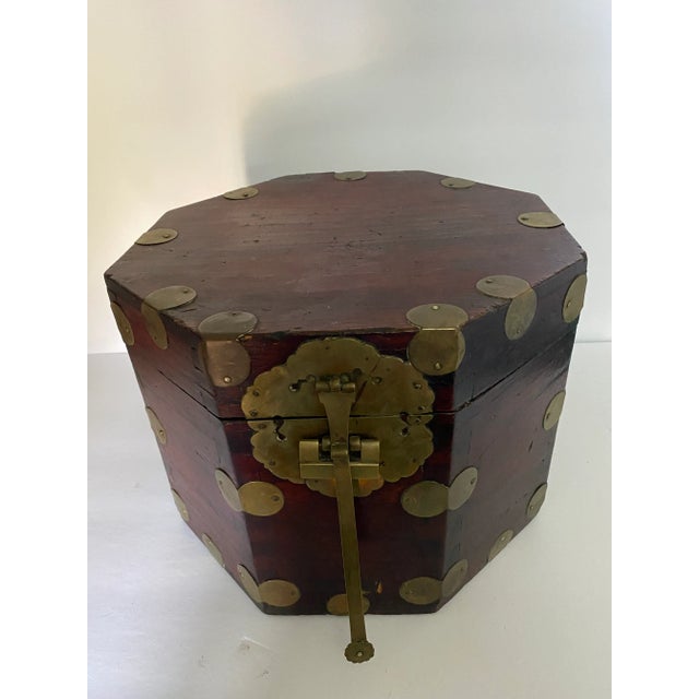 antique Asian octagonal, shape, brass, and wooden box having lock keys and wonderful brass metal work