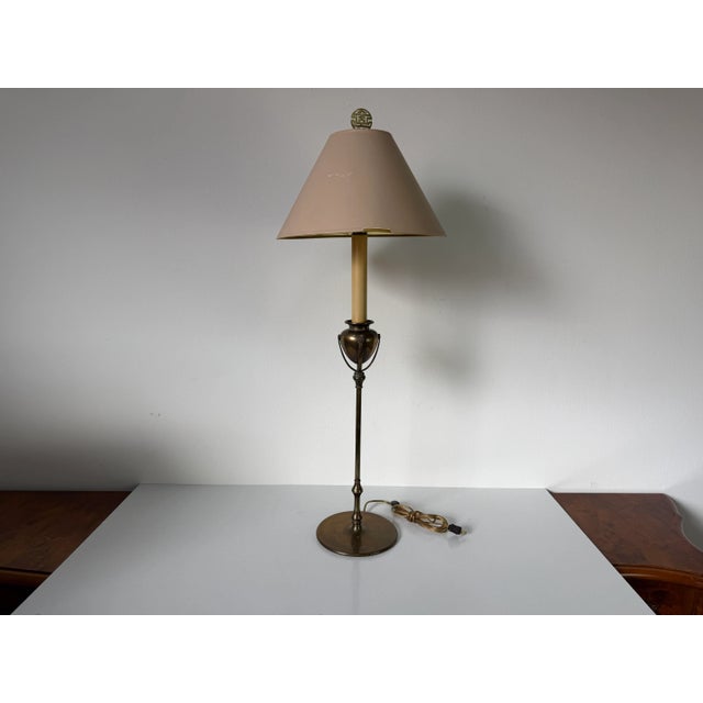 Elegant and timeless, this 1980s vintage Chapman brass table lamp features a refined silhouette with neoclassical...