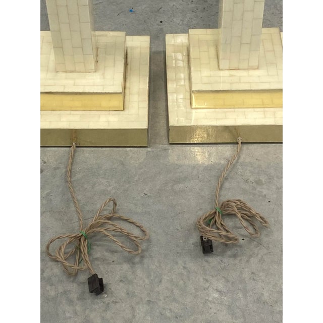 A pair of tessellated tile floor lamps by Enrique Garcel… circa 1970s..recently rewired in very good condition with brass...