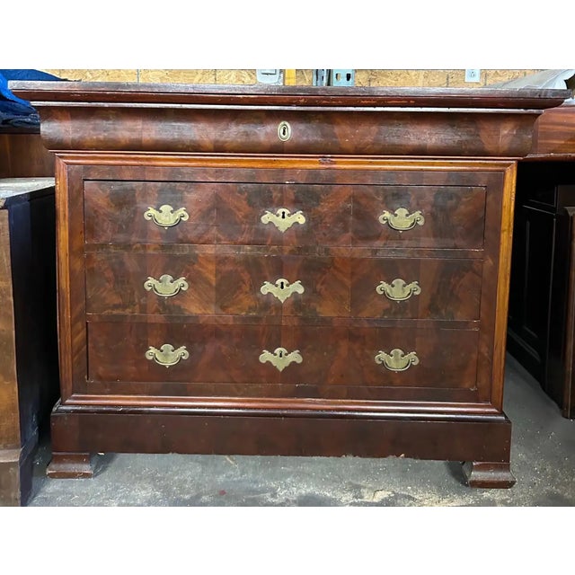 19th century French Louis Phillipe period chest of drawers with book matched mahogany drawers. Beautiful example of the...