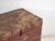 Antique Chinese painted trunk in pine wood, provincial furniture with red paint and inscription originating from northern...