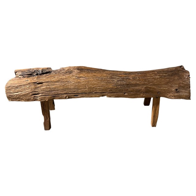 Impressive bench with beautiful character hand made from a single thick teak log with lovely patina. This bench was hand...