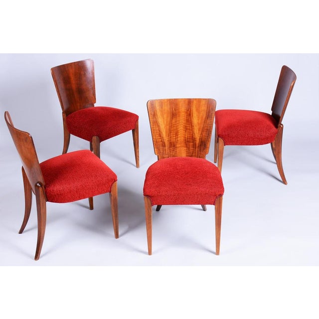 This set of four early 20th-century chairs embodies the iconic Czechoslovak Art Deco design, associated with Jindřich...