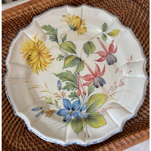 Vintage Italian Nove art pottery earthenware plate featuring a floral motif. The plate is marked on the reverse with "G13V...