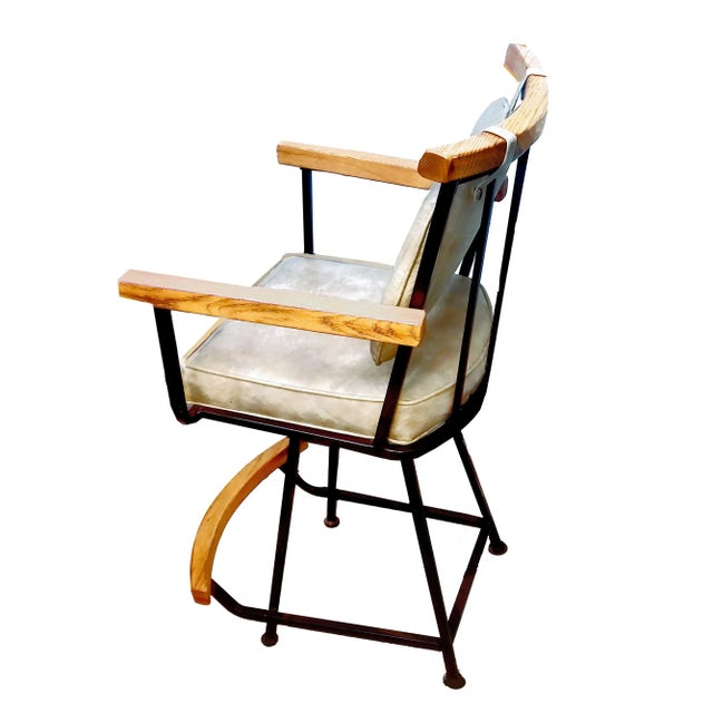 An upholstered swivel counter height / bar stool circa 1960s-1970s Attributed to Cleo Baldon for Inca Products, CA (signed...