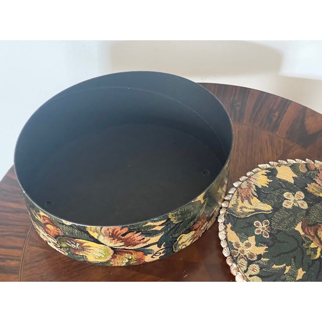 Antique oval paperbox with tapestry design decorated with sea shells.