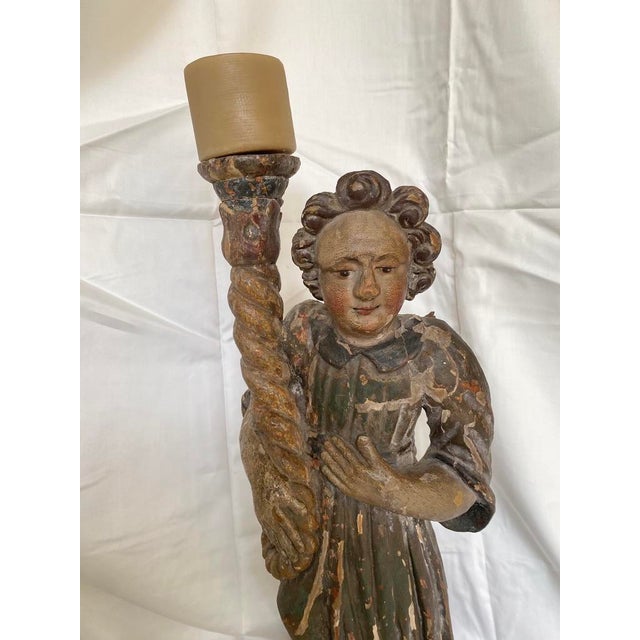 Originally crafted to hold sacred light in a cathedral or private chapel setting, this versatile piece has been preserved...