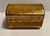 1960s Florentine style gilt and mustardy painted casket form box with with bun feet. Marked "CE Made in Italy" on the...