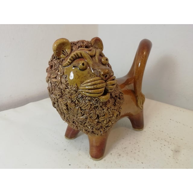 Vintage ceramic lion. Handcrafted. In excellent condition, intact throughout. Unreadable mark on the bottom.