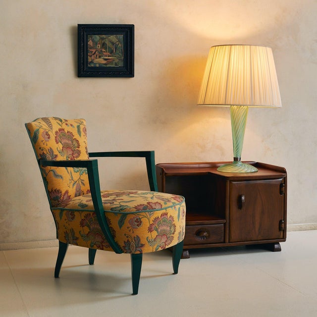 A small carved nightstand attributed to Swiss cabinetmaker Franz Xaver Sproll, dating to the 1950s. Handcrafted in solid...