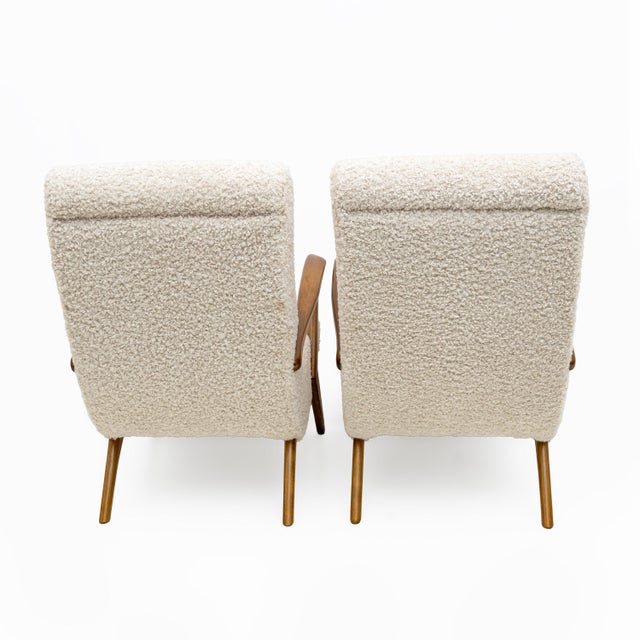 This pair of Italian armchairs captures the essence of mid-20th century modern design, attributed to Paolo Buffa. Made...