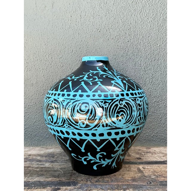 Infuse your interior with the vibrant energy of mid-century Italian design with this striking Raymor ceramic vase....