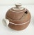 Vintage 1970s modernist Japanese stoneware sugar and creamer set featuring exposed clay body with conical handles....