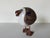 A charming handcrafted art pottery seagull sculpture by Cape Cod artist Susan Davis, featuring a whimsical folk art design...