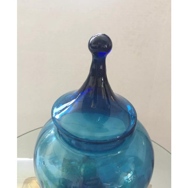 we have for your consideration a very beautiful large and rare mid century modern apothecary jar . manufactured by empoli....