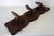Vintage wall-mounted coat rack made in the Hautes-Alpes region, circa 1960s. Carved Swiss pine adorned with three deer...